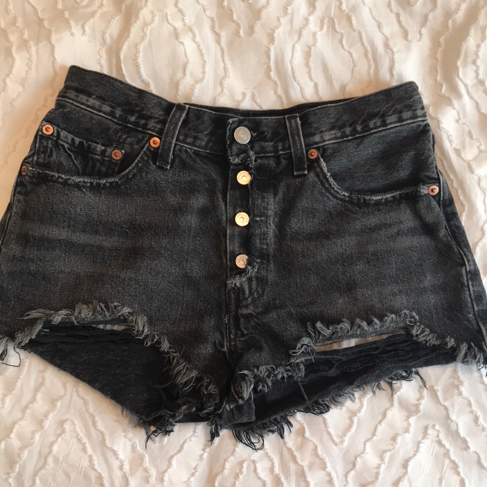 Distressed black Levi shorts